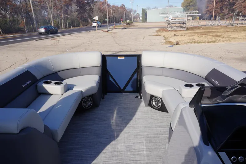 Slide: The Image of 2026 Viaggio Lago V-R pontoon boat interior with gray seating and cup holders. - 48