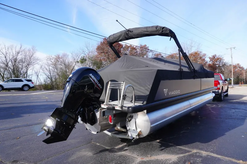 Slide: The Image of 2026 Viaggio Lago V-R pontoon boat with Mercury engine on a trailer. - 73