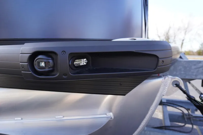 Slide: The Image of Close-up of 2026 Viaggio Lago V-R boat's sleek black exterior detailing. - 8