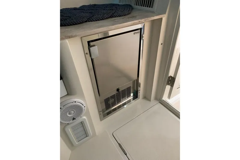 Slide: The Image of 2015 Jupiter 41 SB interior with stainless steel fridge and speaker. - 28