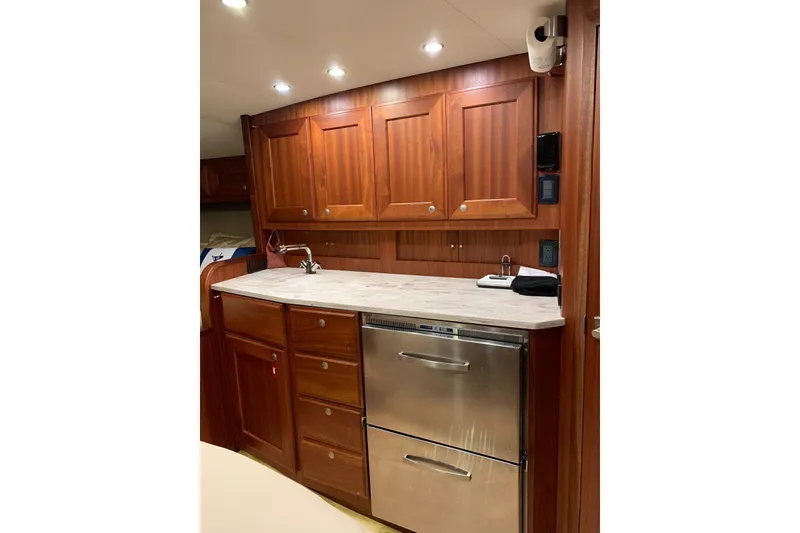 Slide: The Image of Luxurious wooden kitchen interior of 2015 Jupiter 41 SB yacht with modern appliances. - 34