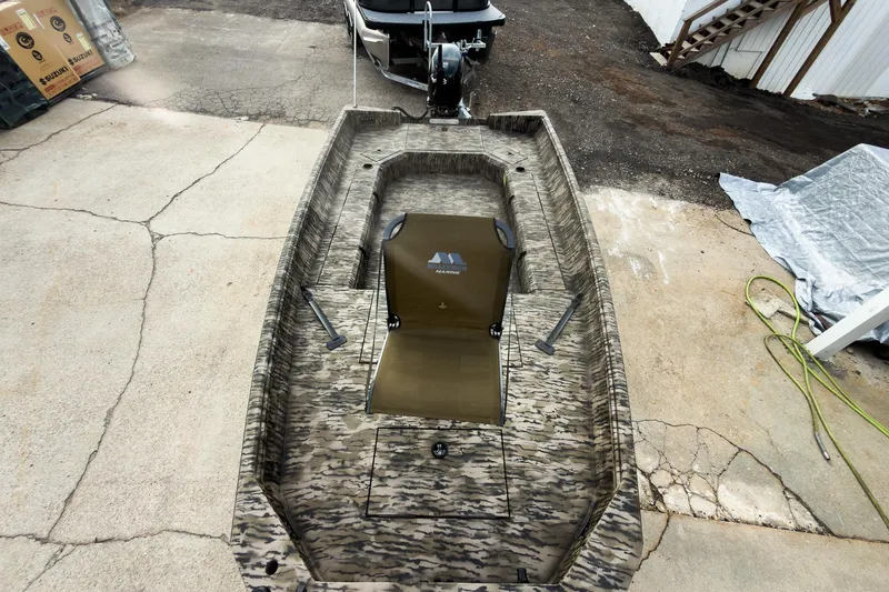 Slide: The Image of 2026 Excel 183 Tomahawk boat with camouflage design and dual seating. - 14