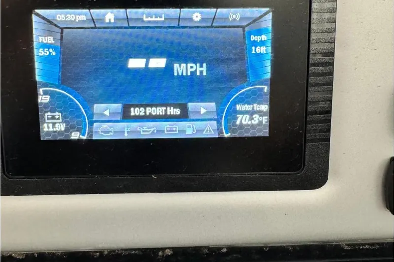 Slide: The Image of Dashboard display of a 2022 Yamaha AR210 boat showing speed, fuel, and water temperature. - 8