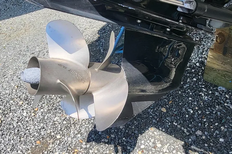 Slide: The Image of Propeller of 2013 Sea Ray 260 Sundeck on gravel surface. - 5