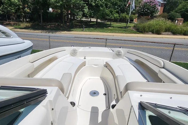 Slide: The Image of 2013 Sea Ray 260 Sundeck boat interior with spacious seating and sleek design. - 6