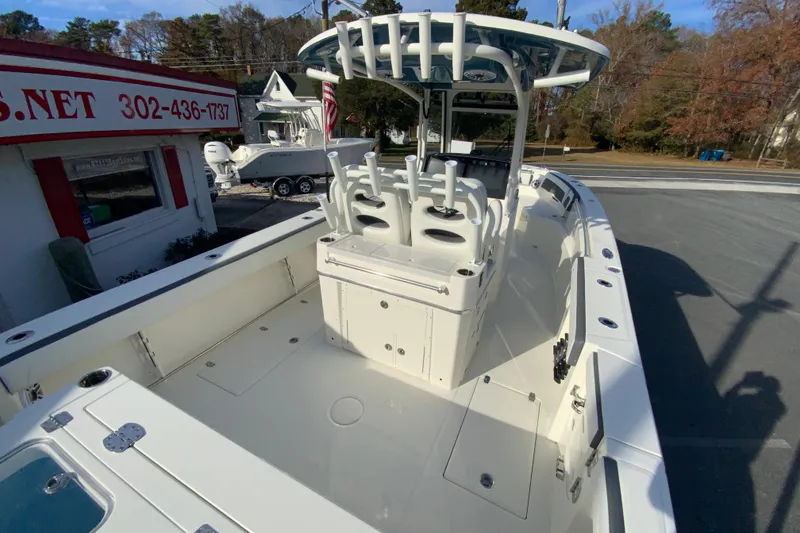 Slide: The Image of 2026 Cobia 285 Center Console boat with spacious deck and modern design. - 11