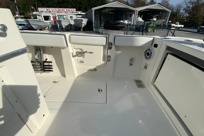Slide: The Image of 2026 Cobia 285 Center Console boat interior at RT 113 Boat Sales. - 19
