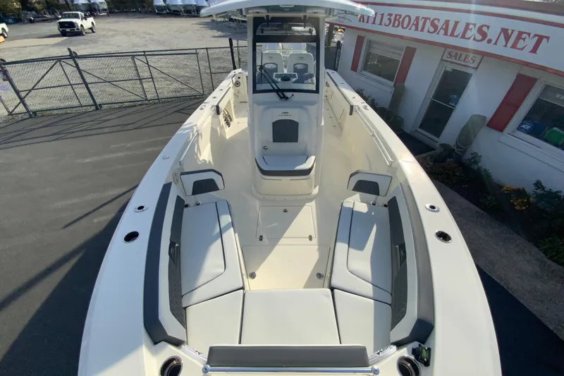 Slide: The Image of 2026 Cobia 285 Center Console boat with spacious seating and modern design. - 34