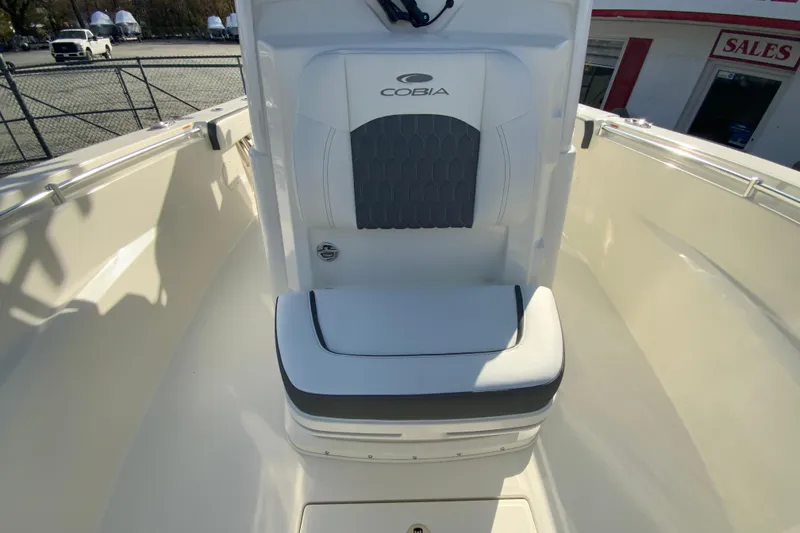 Slide: The Image of 2026 Cobia 285 Center Console boat interior with cushioned seating. - 37