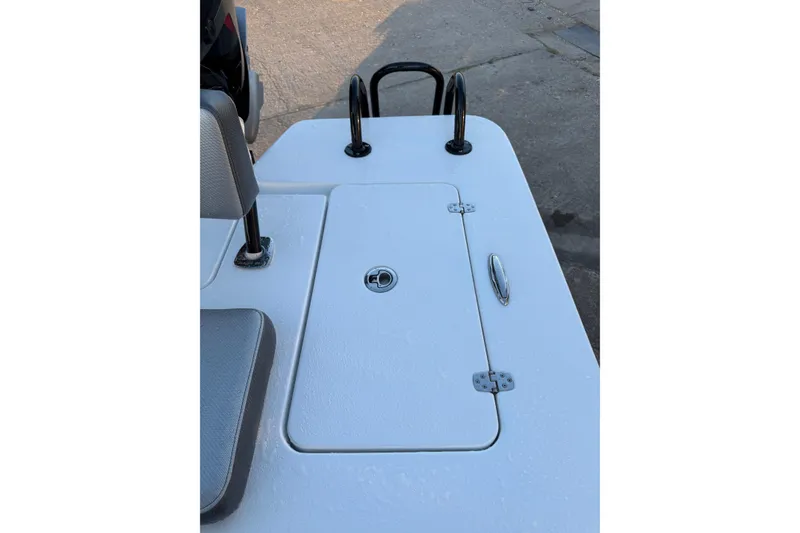 Slide: The Image of 2026 Blazer Bay 675 Ultimate Bay boat deck with storage hatch and seating. - 19