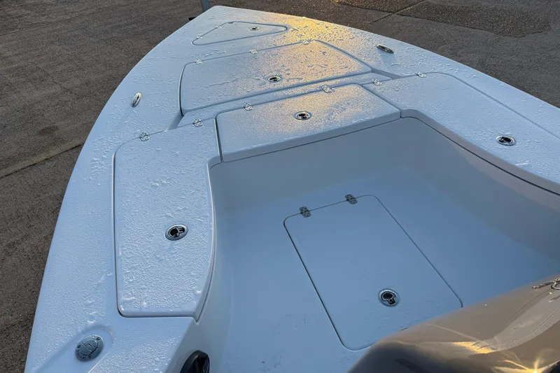 Slide: The Image of 2026 Blazer Bay 675 Ultimate Bay boat deck with storage compartments. - 6