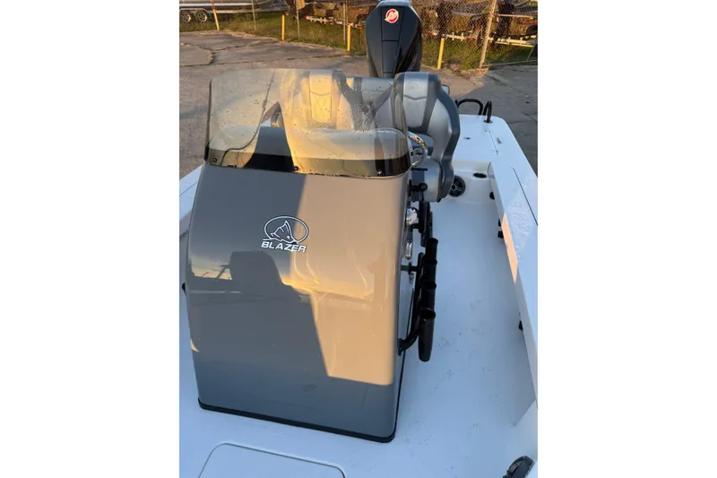 Slide: The Image of 2026 Blazer Bay 675 Ultimate Bay boat console with seating and controls. - 8