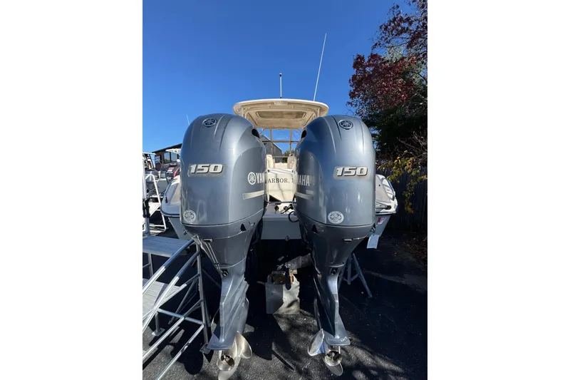 Slide: The Image of 2017 Grady-White Freedom 255 boat with dual Yamaha 150 outboard engines. - 2