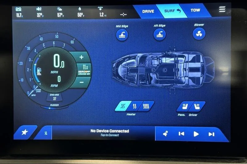 Slide: The Image of Touchscreen display of 2025 MasterCraft XT24 boat control panel with speedometer and bilge controls. - 37