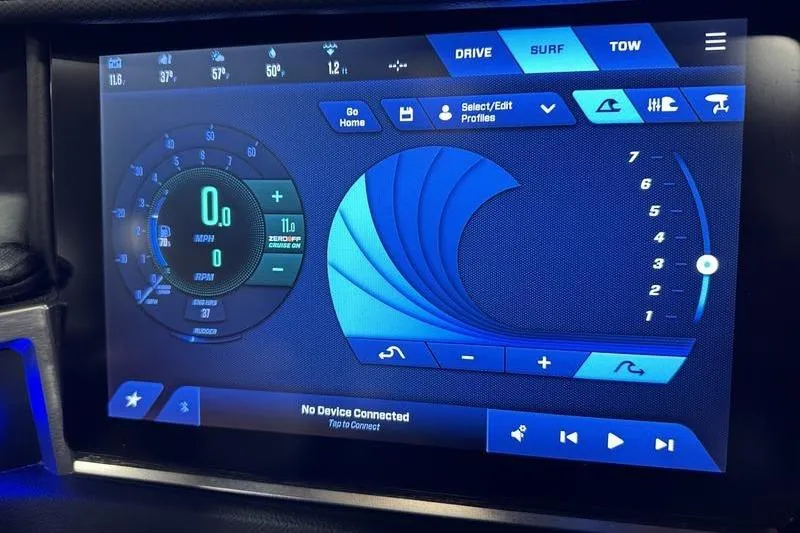 Slide: The Image of 2025 MasterCraft XT24 touchscreen display showing surf and drive settings. - 39