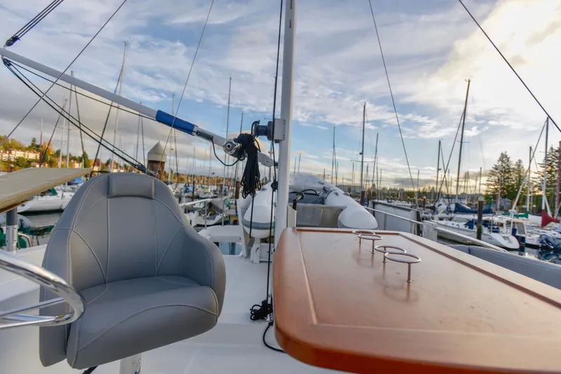 Slide: The Image of Interior of 2013 Beneteau Swift Trawler 34 Fly, featuring a compact kitchen area. - 10