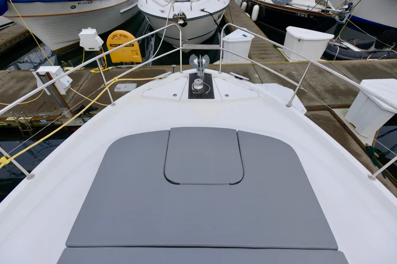 Slide: The Image of Bathroom interior of 2013 Beneteau Swift Trawler 34 Fly with towels and skylight. - 23