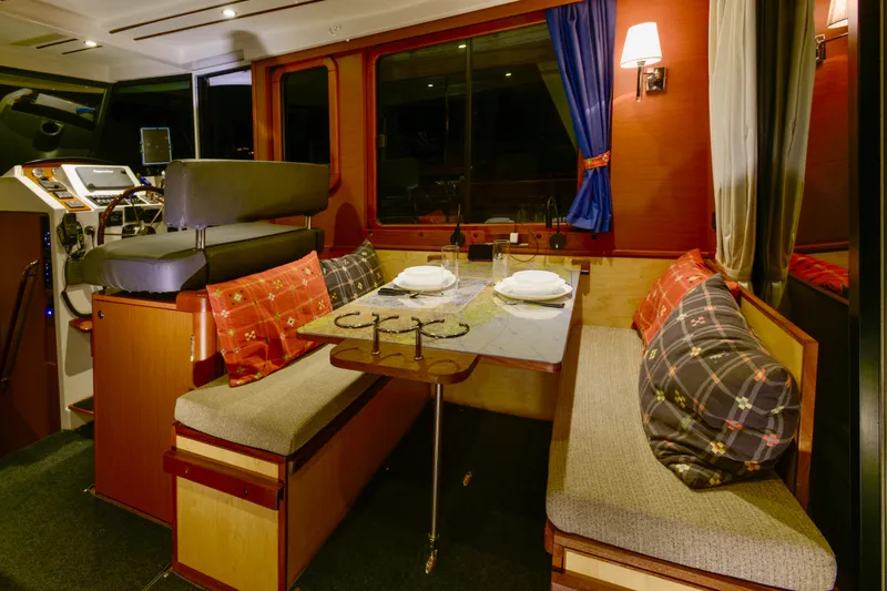 Slide: The Image of Power outlet on 2013 Beneteau Swift Trawler 34 Fly, with hand lifting cover. - 26