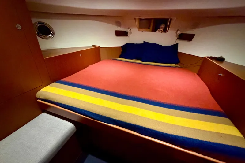 Slide: The Image of 2013 Beneteau Swift Trawler 34 Fly with swim platform and ladder at dock. - 46