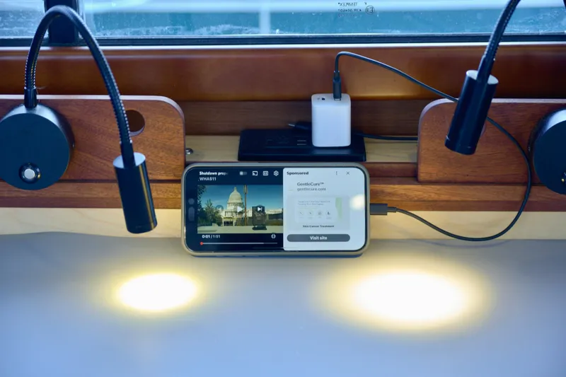 Slide: The Image of 2013 Beneteau Swift Trawler 34 Fly with champagne glass decal on hull. - 47