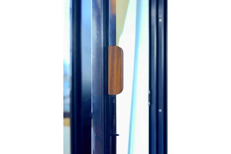 Slide: The Image of Electrical system setup in a 2013 Beneteau Swift Trawler 34 Fly, featuring batteries and inverters. - 48