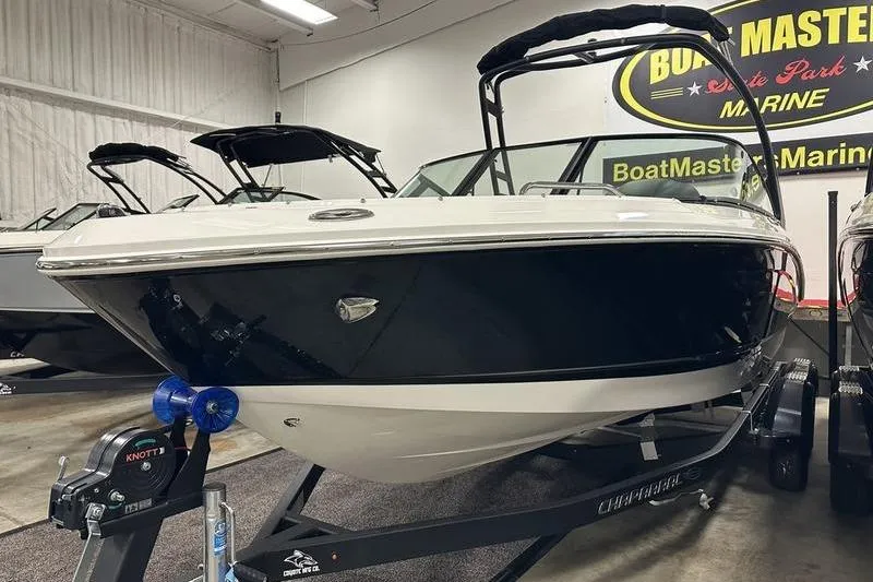 Slide: The Image of 2026 Chaparral 21 SSi boat displayed indoors at BoatMaster Marine showroom. - 5