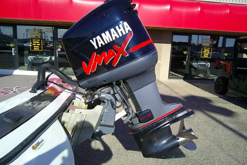 Slide: The Image of 2006 Skeeter ZX190 with Yamaha VMAX outboard motor in front of dealership. - 3