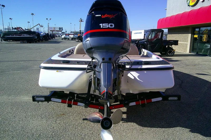 Slide: The Image of 2006 Skeeter ZX190 boat with Yamaha 150 engine in a dealership lot. - 4