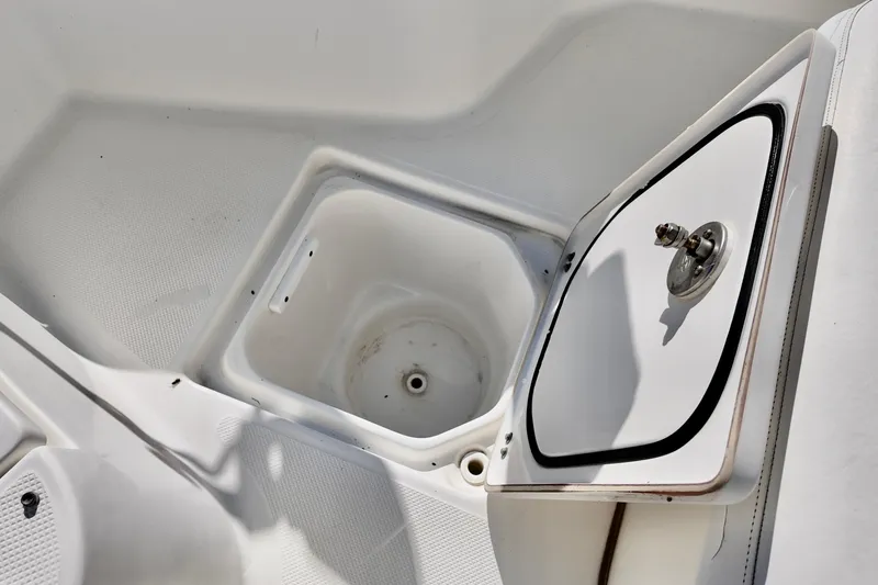 Slide: The Image of Open storage compartment on 2015 Sea Fox 246 Commander boat. - 10