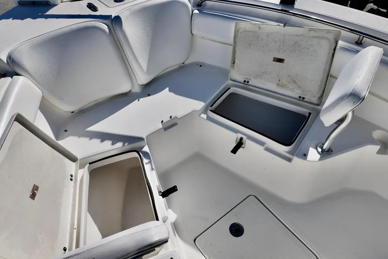 Slide: The Image of 2015 Sea Fox 246 Commander boat interior with open storage compartments. - 12