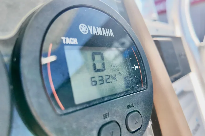 Slide: The Image of Yamaha tachometer on 2015 Sea Fox 246 Commander boat, displaying 632.4 hours. - 3