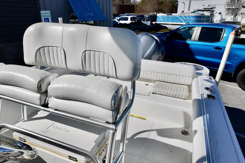 Slide: The Image of 2015 Sea Fox 246 Commander boat interior with white seating and console. - 7