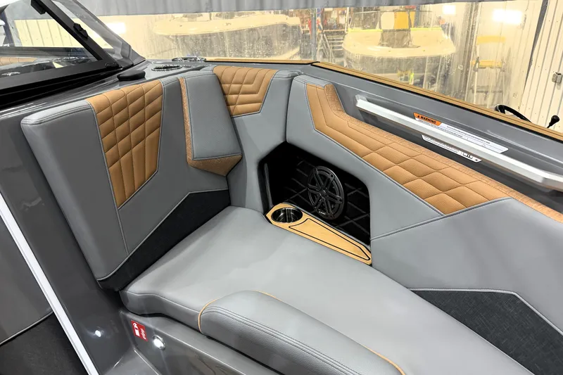 Slide: The Image of 2026 Nautique Super Air Nautique S21 interior with luxurious seating and modern design. - 10