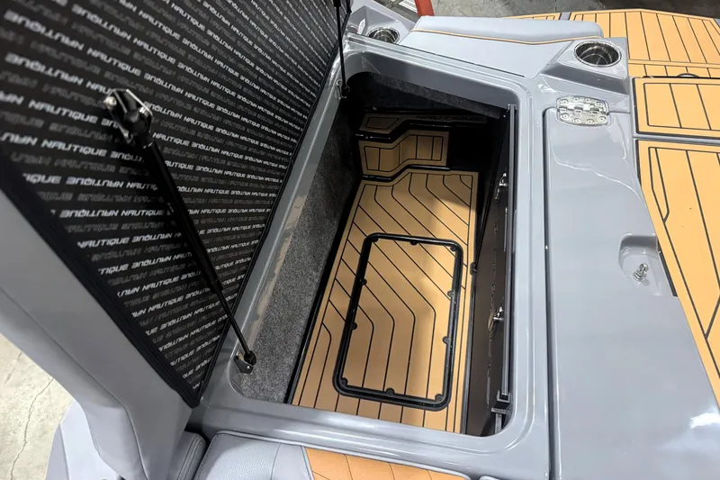 Slide: The Image of 2026 Nautique Super Air Nautique S21 storage compartment with sleek design and durable materials. - 14