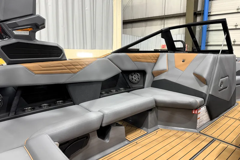 Slide: The Image of 2026 Nautique Super Air Nautique S21 interior with luxurious seating and modern design. - 19