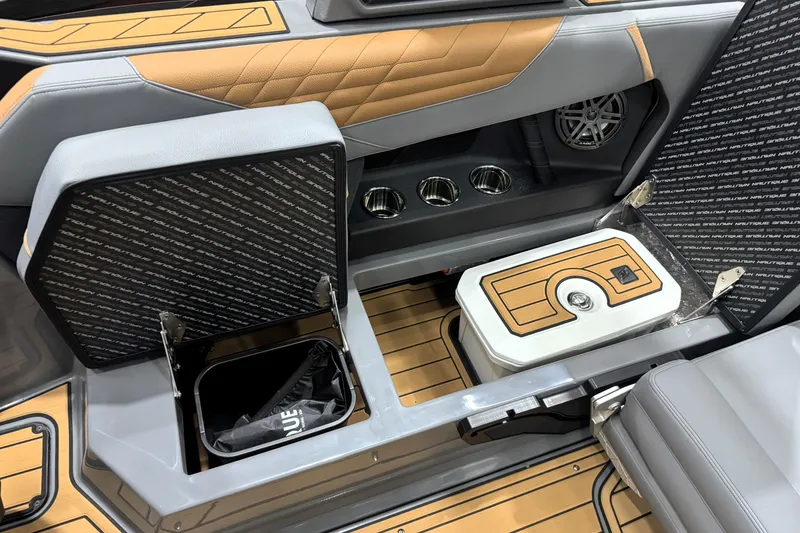 Slide: The Image of 2026 Nautique Super Air Nautique S21 interior storage compartments and seating detail. - 28