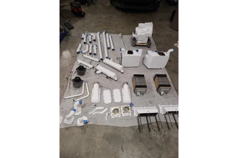 Slide: The Image of Control panel of a 1985 Post 43 Convertible with switches and hour meter. - 9