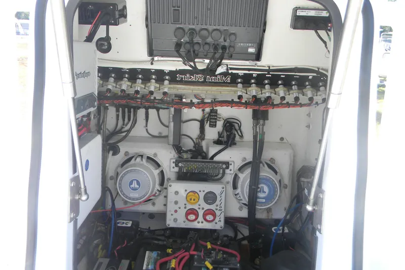 Slide: The Image of 2015 Yellowfin 24 Bay boat helm with Garmin display and steering wheel. - 5