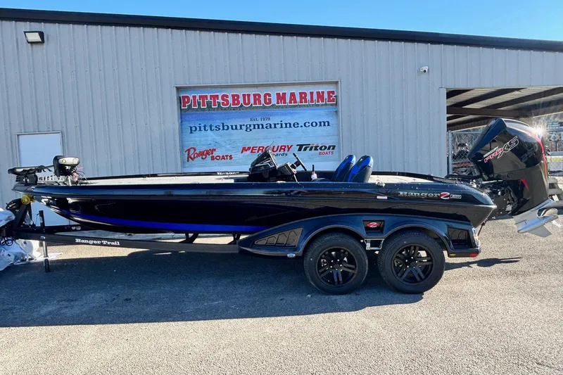 The Image of 2026 Ranger Z521 boat at Pittsburg Marine dealership, featuring sleek design and powerful engine. - 0