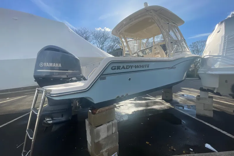 Slide: The Image of 2018 Grady-White Freedom 235 boat with Yamaha engine on display. - 11