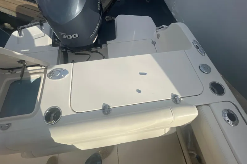 Slide: The Image of 2018 Grady-White Freedom 235 boat deck with Yamaha 300 engine. - 31