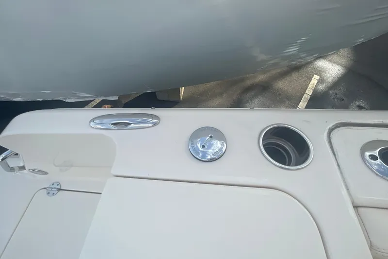 Slide: The Image of 2018 Grady-White Freedom 235 boat deck with cup holder and fittings. - 32