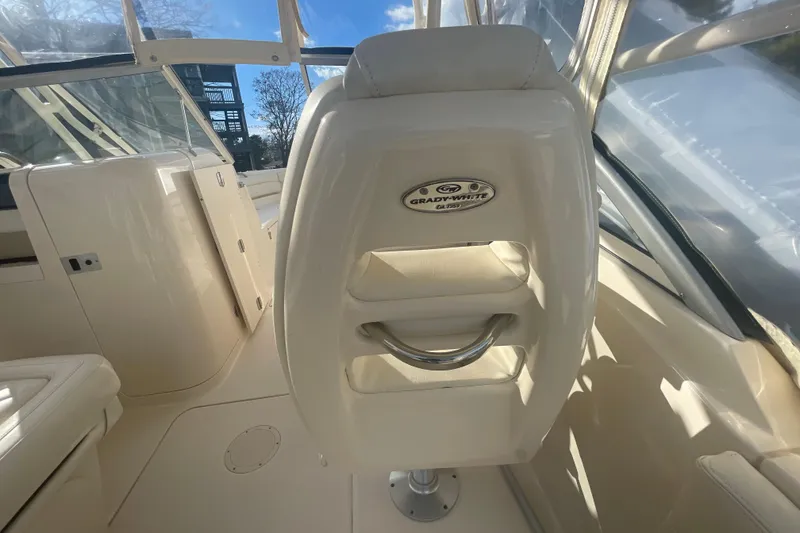 Slide: The Image of 2018 Grady-White Freedom 235 boat interior with seating and helm details. - 41