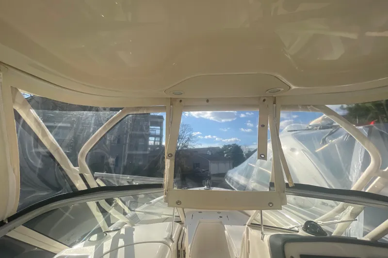 Slide: The Image of Interior view of 2018 Grady-White Freedom 235 boat with clear skies. - 62