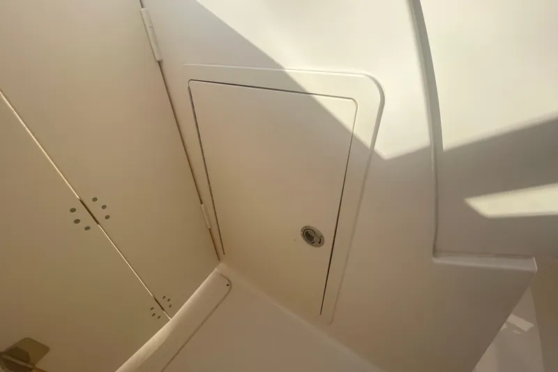 Slide: The Image of 2018 Grady-White Freedom 235 boat interior compartment detail. - 66