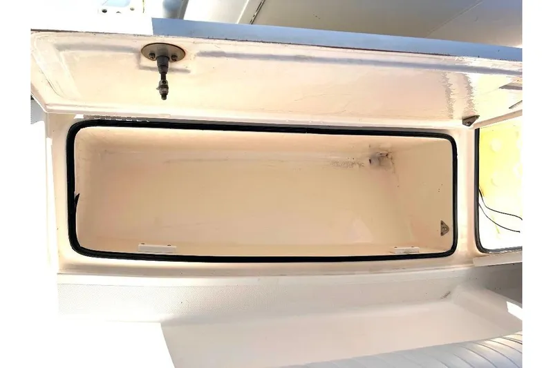 Slide: The Image of Open storage compartment on 2008 McKee Craft Freedom 28 FS/CC boat. - 12