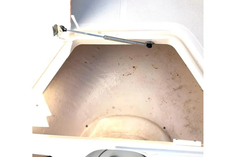 Slide: The Image of Open storage compartment in 2008 McKee Craft Freedom 28 FS/CC boat. - 16