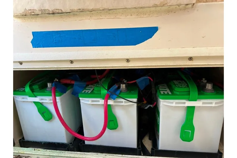 Slide: The Image of Batteries installed in a 2008 McKee Craft Freedom 28 FS/CC boat compartment. - 21