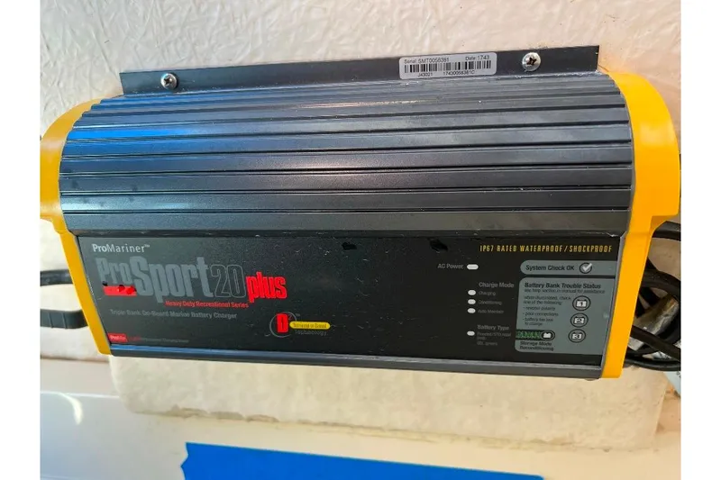 Slide: The Image of ProMariner ProSport 20 Plus marine battery charger, mounted on a 2008 McKee Craft Freedom 28 FS/CC. - 22