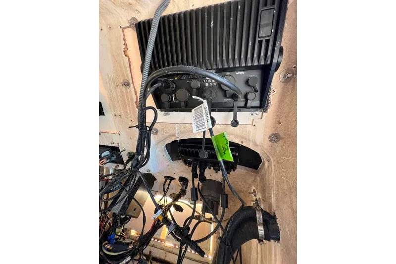 Slide: The Image of 2008 McKee Craft Freedom 28 FS/CC boat wiring and control panel. - 23